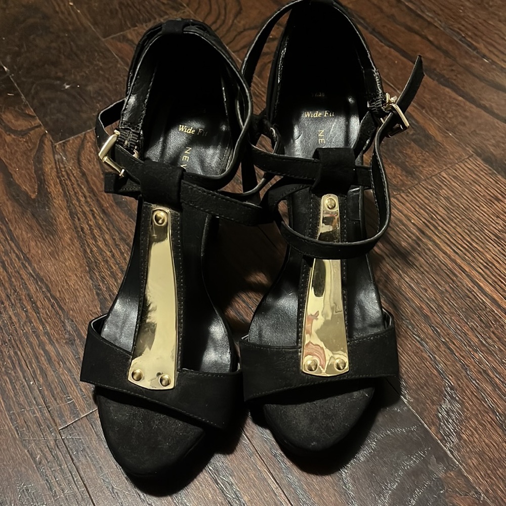 Black open toe heels with gold metal accents!